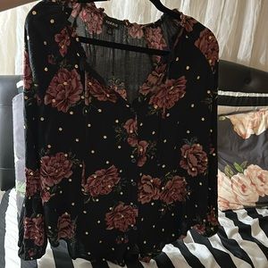 Black floral top with gold polkadots